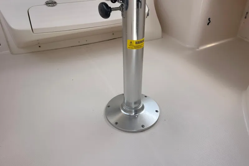  Yacht Photos Pics Boat interior of 2003 Grady-White Express 330, featuring a metal pedestal base.