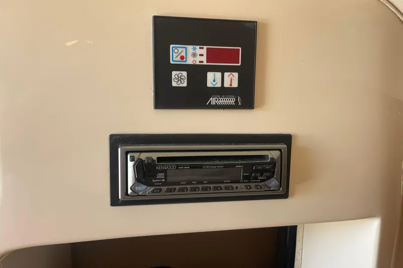  Yacht Photos Pics 2003 Grady-White Express 330 control panel with Kenwood stereo system.