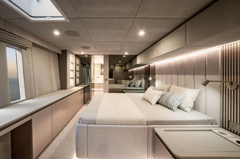  Yacht Photos Pics Luxurious interior of 2025 Sunreef 80 yacht with modern bedroom design and ambient lighting.