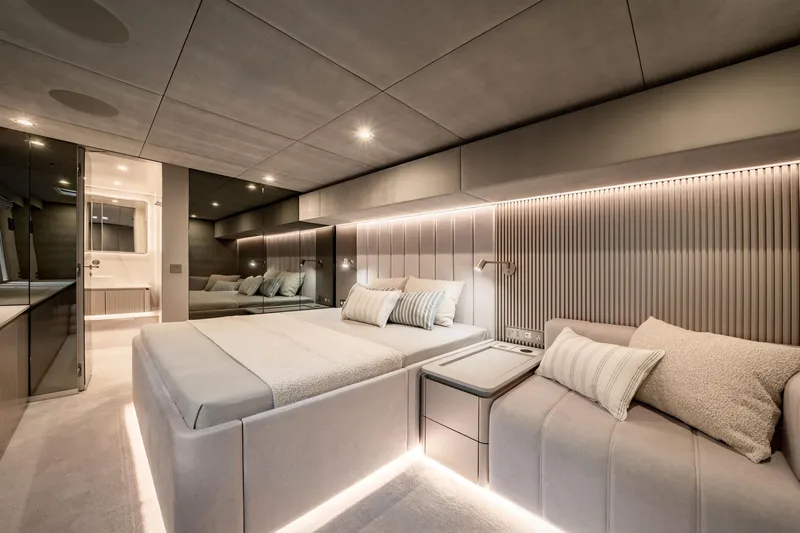  Yacht Photos Pics Luxurious interior of 2025 Sunreef 80 yacht with modern bedroom design.