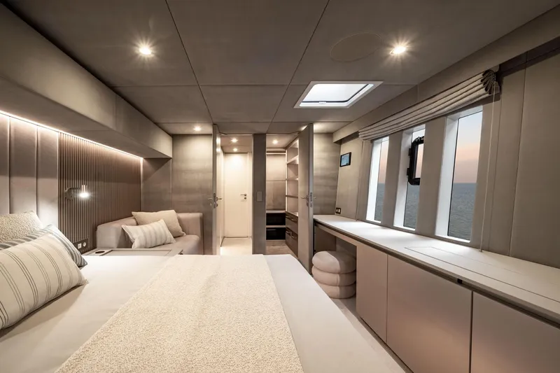  Yacht Photos Pics Luxurious interior of 2025 Sunreef 80 yacht with modern bedroom design and ocean view.