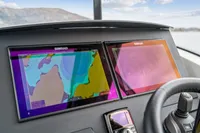 Dashboard of 2021 Nimbus C11 with dual Simrad navigation screens.