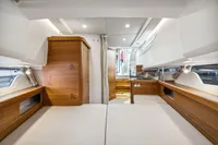Luxurious interior of 2021 Nimbus C11 boat with wooden accents and modern design.