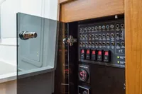 Electrical panel inside a 2021 Nimbus C11 boat, featuring switches and gauges.
