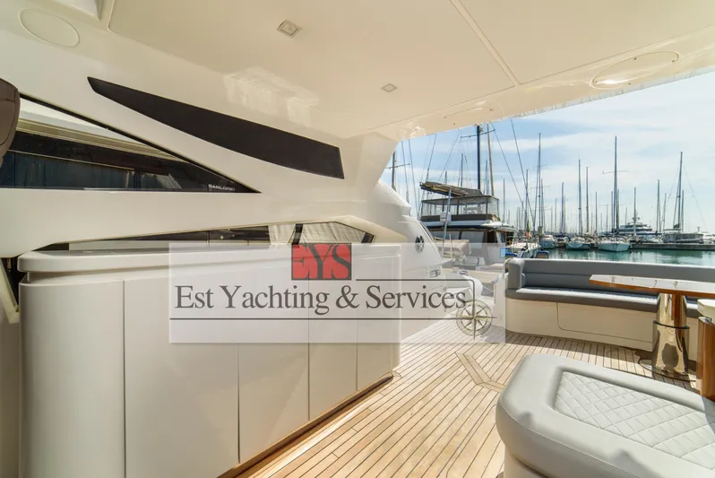  Yacht Photos Pics Luxurious 2004 Sunseeker Predator 68 yacht interior with marina view.