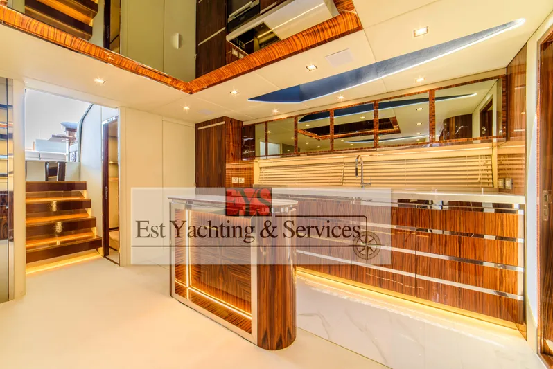  Yacht Photos Pics Luxurious interior of 2004 Sunseeker Predator 68 yacht with modern wood finishes.