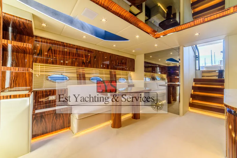  Yacht Photos Pics Luxurious interior of 2004 Sunseeker Predator 68 yacht with elegant wood finishes and modern design.