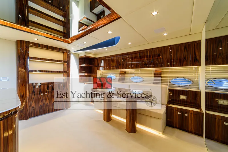  Yacht Photos Pics Luxurious interior of 2004 Sunseeker Predator 68 yacht with elegant wood finishes.