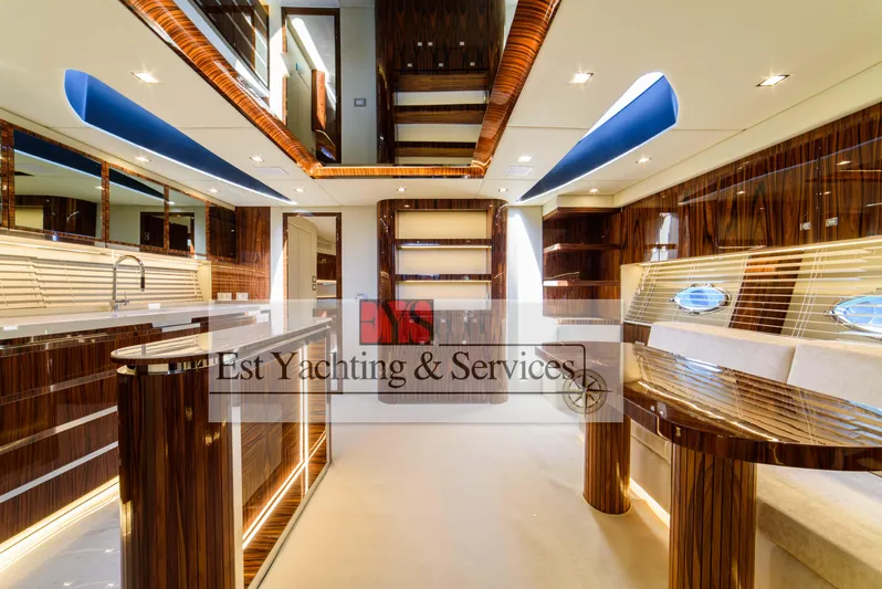  Yacht Photos Pics Luxurious interior of a 2004 Sunseeker Predator 68 yacht with modern wood finishes.