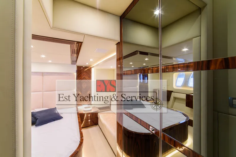  Yacht Photos Pics Luxurious interior of 2004 Sunseeker Predator 68 yacht bedroom with modern design.