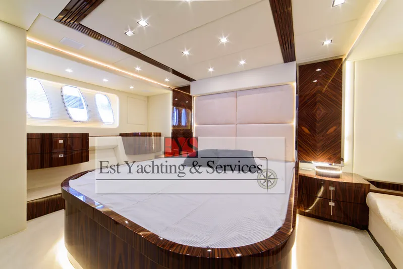  Yacht Photos Pics Luxurious interior of 2004 Sunseeker Predator 68 yacht with elegant wood finishes.