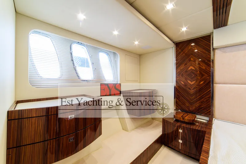 Yacht Photos Pics Luxurious interior of 2004 Sunseeker Predator 68 yacht with elegant wood finishes.