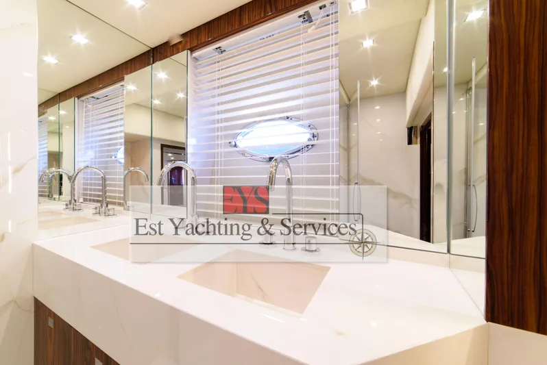  Yacht Photos Pics Luxurious bathroom interior of 2004 Sunseeker Predator 68 yacht with modern fixtures.