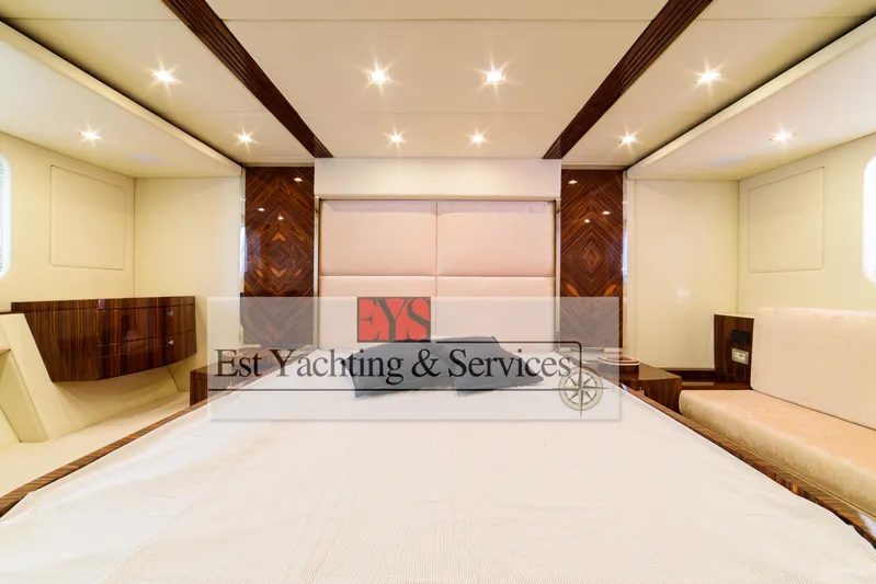  Yacht Photos Pics Luxurious interior of 2004 Sunseeker Predator 68 yacht with elegant wood finishes.