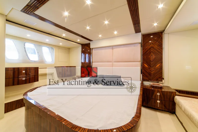  Yacht Photos Pics Luxurious interior of 2004 Sunseeker Predator 68 yacht with elegant wood finishes.