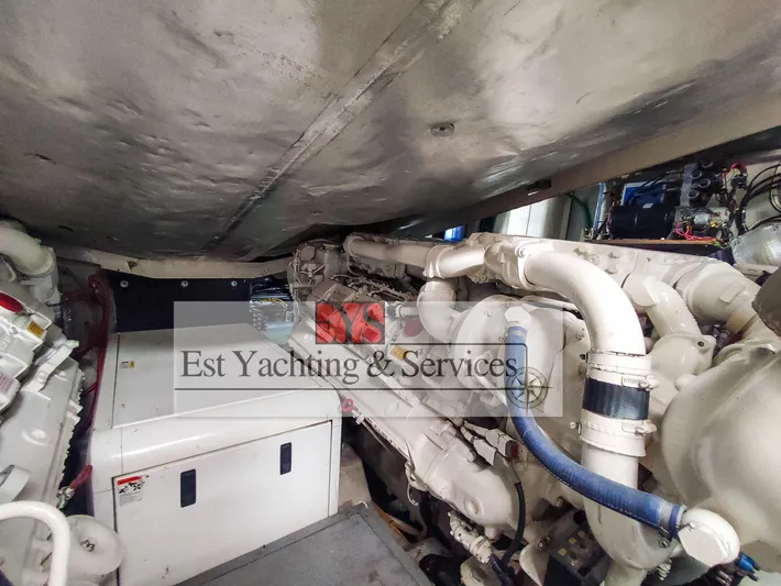  Yacht Photos Pics Engine room of 2004 Sunseeker Predator 68 yacht, featuring mechanical components and piping.