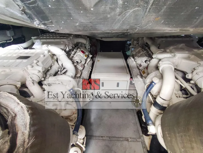  Yacht Photos Pics Engine room of 2004 Sunseeker Predator 68 yacht, featuring dual engines and mechanical components.