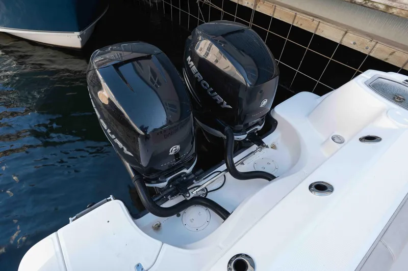  Yacht Photos Pics Twin Mercury outboard engines on a 2016 Boston Whaler 285 Conquest Pilothouse boat.