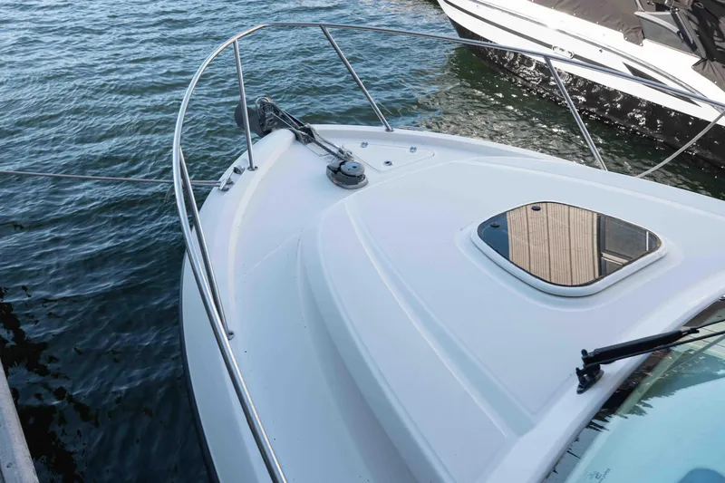  Yacht Photos Pics 2016 Boston Whaler 285 Conquest Pilothouse boat docked on water.