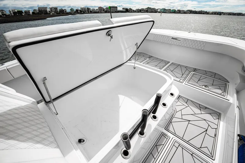  Yacht Photos Pics 2024 Front Runner 37 Catamaran with open storage compartment and stylish deck design.