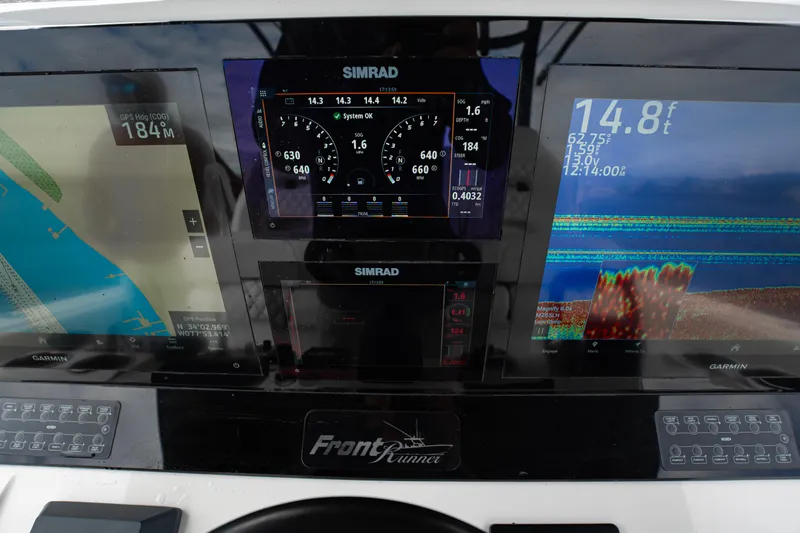  Yacht Photos Pics Dashboard of 2024 Front Runner 37 Catamaran with Simrad and Garmin displays.