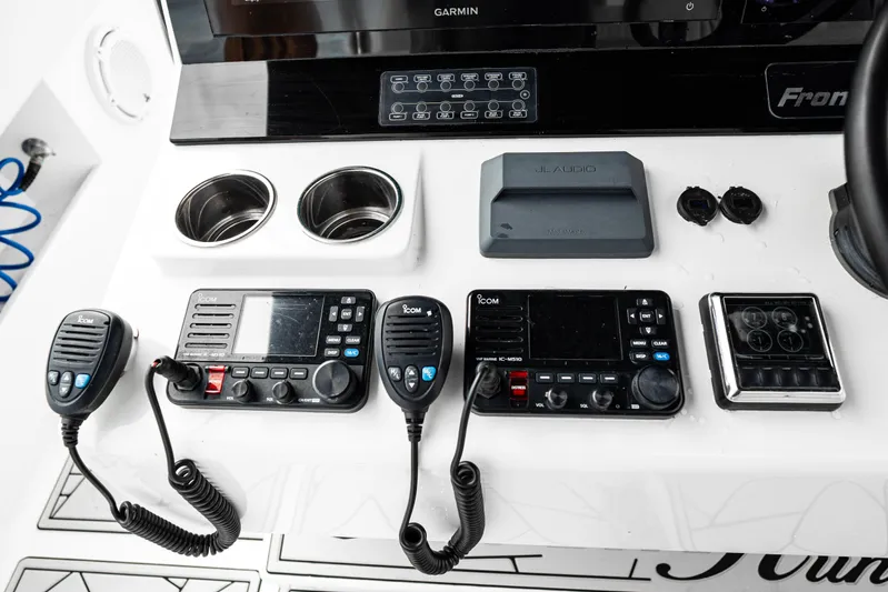  Yacht Photos Pics 2024 Front Runner 37 Catamaran dashboard with communication equipment and controls.
