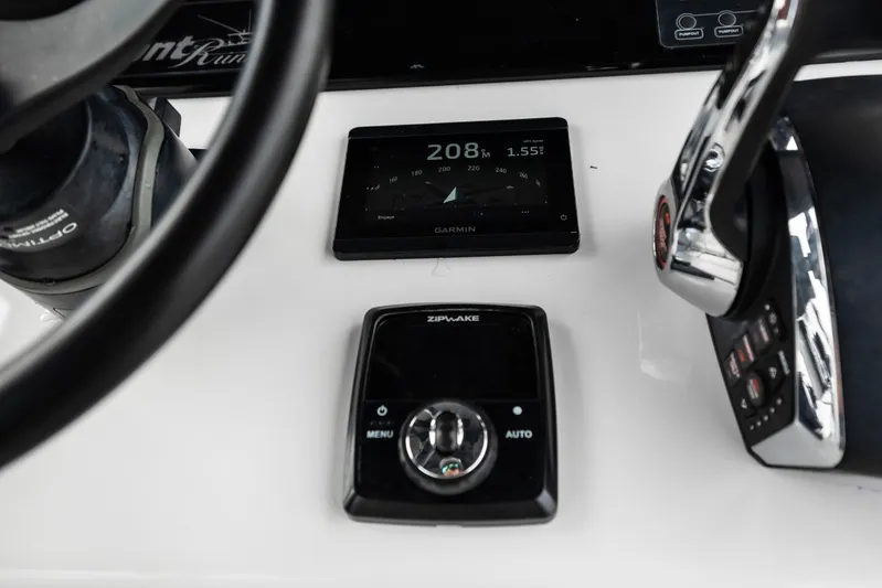  Yacht Photos Pics Control panel of 2024 Front Runner 37 Catamaran with Garmin and Zipwake systems.