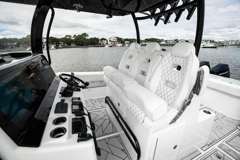  Yacht Photos Pics 2024 Front Runner 37 Catamaran interior with luxurious seating and advanced controls.