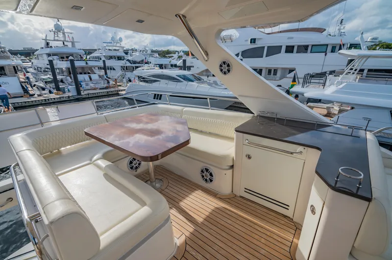 Discover Yacht Photos Pics Luxurious 2015 Sea Ray 510 Fly yacht with elegant seating and marina view.