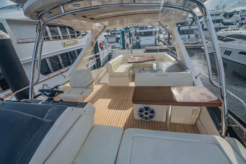 Discover Yacht Photos Pics Luxurious 2015 Sea Ray 510 Fly yacht with spacious deck and seating area.