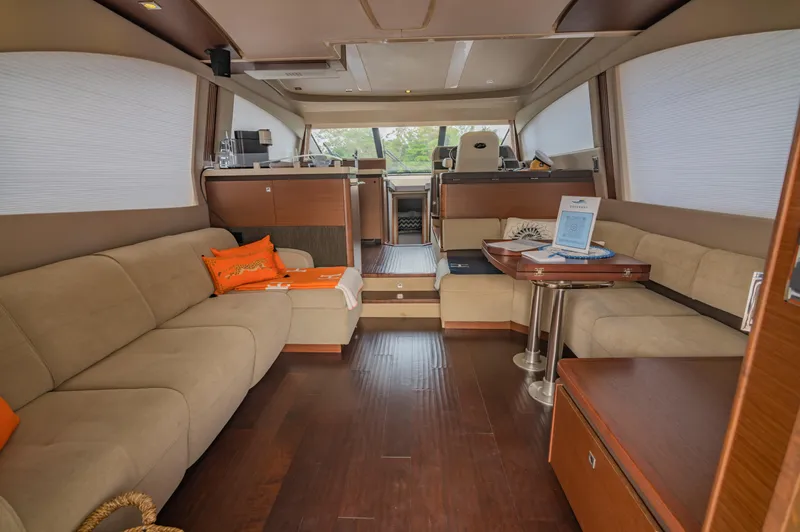 Discover Yacht Photos Pics Luxurious interior of 2015 Sea Ray 510 Fly yacht with elegant seating and modern design.