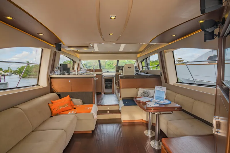 Discover Yacht Photos Pics Luxurious interior of 2015 Sea Ray 510 Fly yacht with spacious seating and modern design.