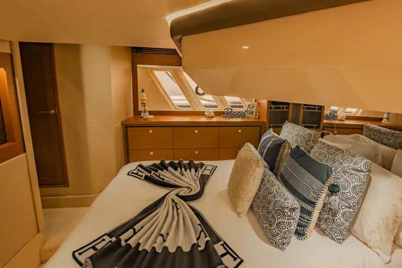 Discover Yacht Photos Pics Luxurious bedroom interior of 2015 Sea Ray 510 Fly yacht with elegant decor.