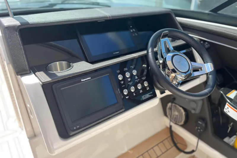  Yacht Photos Pics 2018 Sea Ray SLX 350 helm with modern controls and sleek steering wheel.