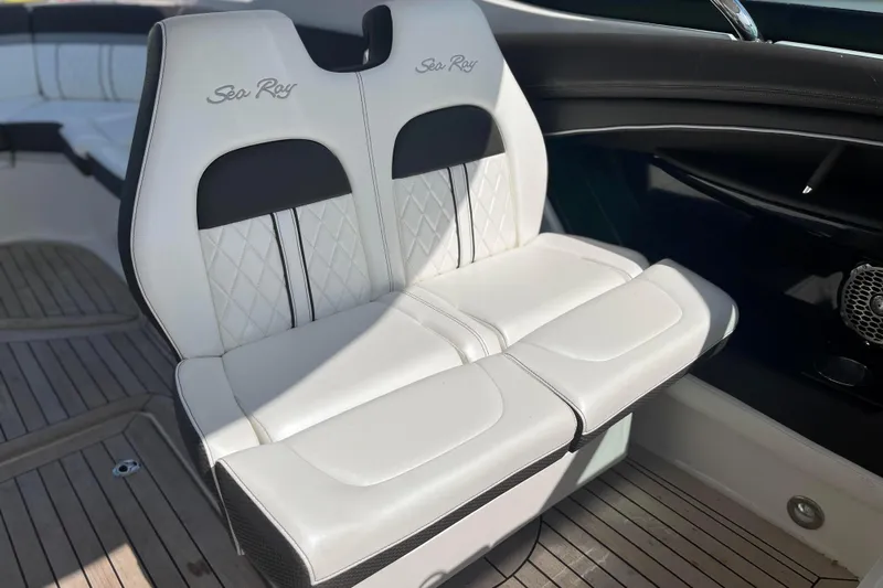  Yacht Photos Pics 2018 Sea Ray SLX 350 boat interior with white leather seating and wood flooring.