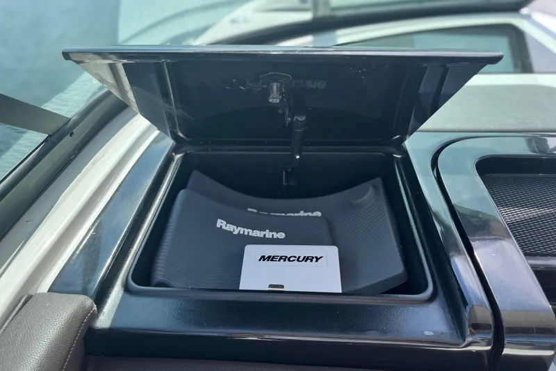  Yacht Photos Pics Open compartment on 2018 Sea Ray SLX 350 with Raymarine and Mercury equipment.