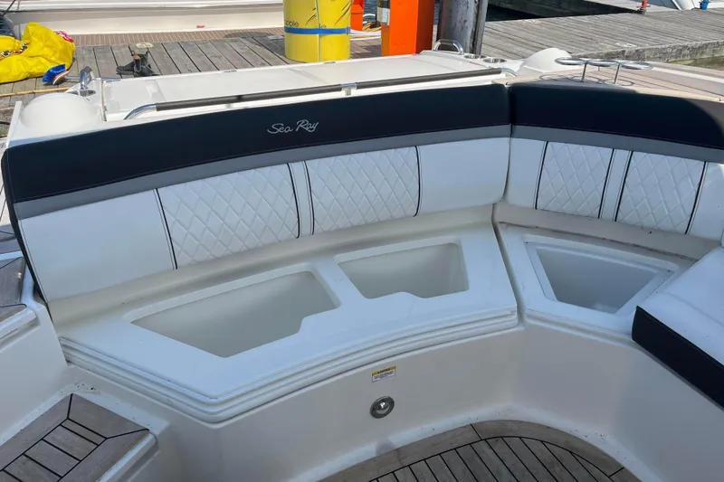  Yacht Photos Pics 2018 Sea Ray SLX 350 boat seating area with quilted upholstery and storage compartments.