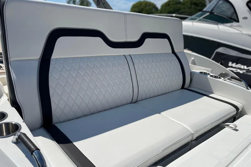  Yacht Photos Pics 2018 Sea Ray SLX 350 boat seat with diamond-pattern upholstery and cup holders.