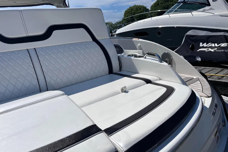  Yacht Photos Pics 2018 Sea Ray SLX 350 boat with luxurious white seating and sleek design.