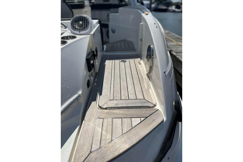  Yacht Photos Pics 2018 Sea Ray SLX 350 boat deck with wood finish and speaker detail.