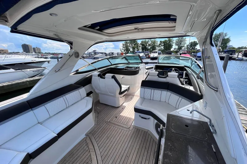  Yacht Photos Pics Luxurious 2018 Sea Ray SLX 350 boat interior with spacious seating and modern amenities.