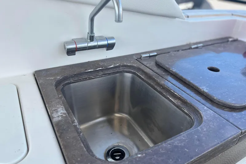  Yacht Photos Pics Stainless steel sink on 2018 Sea Ray SLX 350 boat with modern faucet.