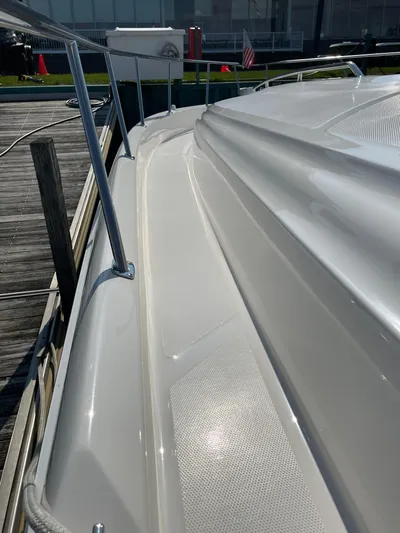  Yacht Photos Pics 2000 Sea Ray 460 Sundancer yacht, sleek deck view at marina.