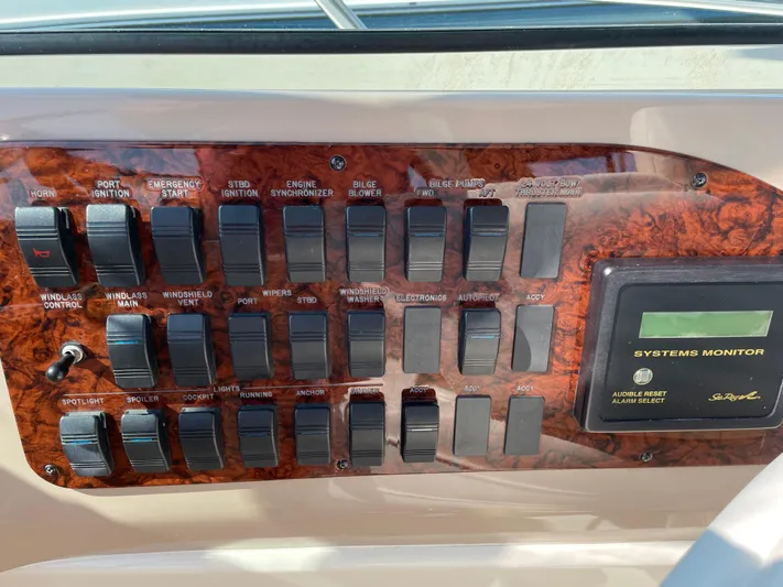  Yacht Photos Pics Control panel of a 2000 Sea Ray 460 Sundancer boat with switches and systems monitor.