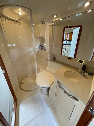  Yacht Photos Pics Luxurious bathroom in 2000 Sea Ray 460 Sundancer yacht with shower and vanity.