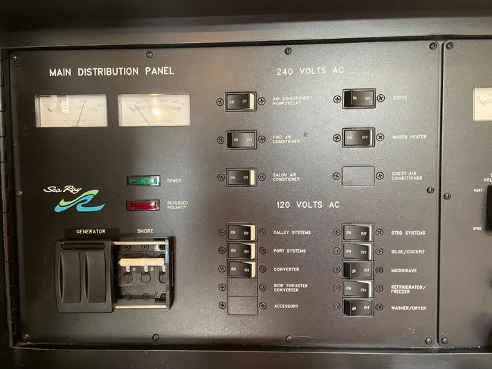  Yacht Photos Pics Main distribution panel of 2000 Sea Ray 460 Sundancer boat, showing electrical controls.
