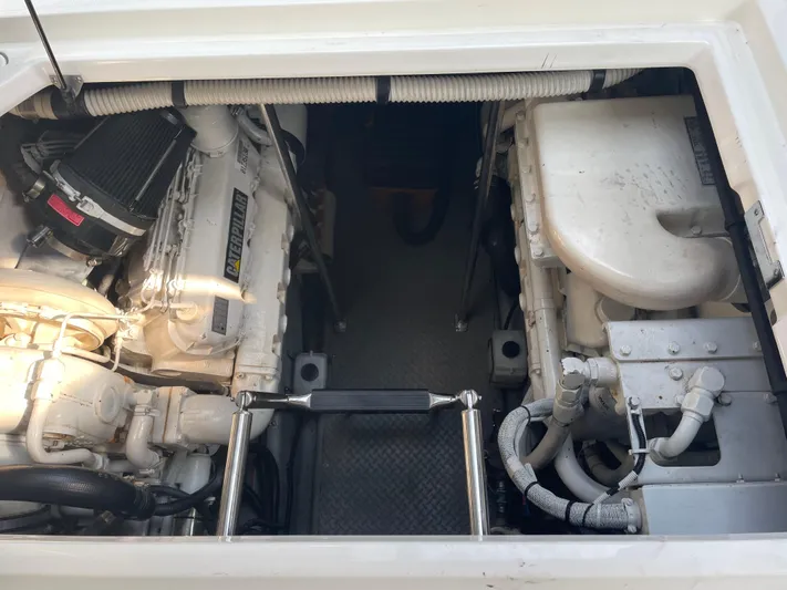  Yacht Photos Pics Engine compartment of 2000 Sea Ray 460 Sundancer yacht, showcasing dual engines.