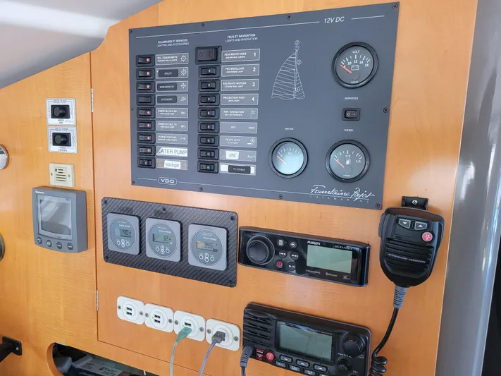  Yacht Photos Pics Control panel of a 2006 Fountaine Pajot LAVEZZI catamaran with gauges and communication devices.