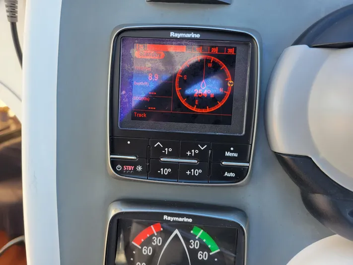  Yacht Photos Pics Raymarine navigation display on 2006 Fountaine Pajot LAVEZZI catamaran, showing compass and controls.
