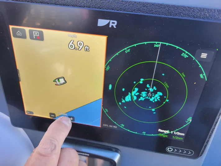 Yacht Photos Pics Touchscreen navigation display on 2006 Fountaine Pajot LAVEZZI catamaran, showing radar and depth.